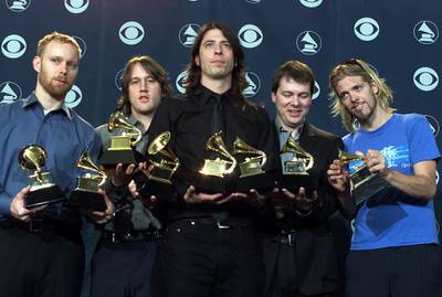 Foo Fighters with their awards at the 43rd Annual Grammy Awards in Los Angeles on February 21, 2001. AFP