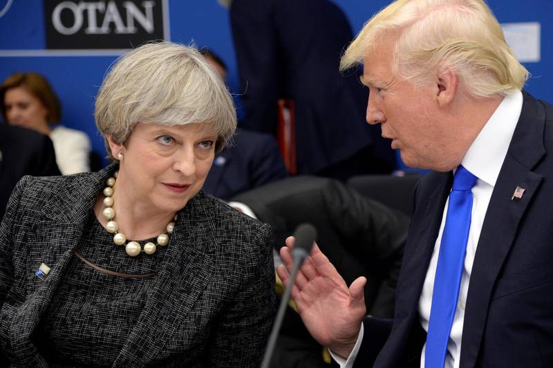 epa06358803 (FILE) - Britain's Prime Minister Theresa May (L) and US President Donald Trump (R) speak during a working dinner meeting at the NATO summit in Brussels, Belgium, 25 May 2017. Media reports on 30 November 2017 state that Donald Trump has replied to Theresa May after she criticised him for retweeting a string of anti-Muslim videos from far-right group Britain First. Trump replied on the social media site: 'Theresa @theresamay, don't focus on me, focus on the destructive Radical Islamic Terrorism that is taking place within the United Kingdom. We are doing just fine!'  EPA/THIERRY CHARLIER / POOL *** Local Caption *** 53545619