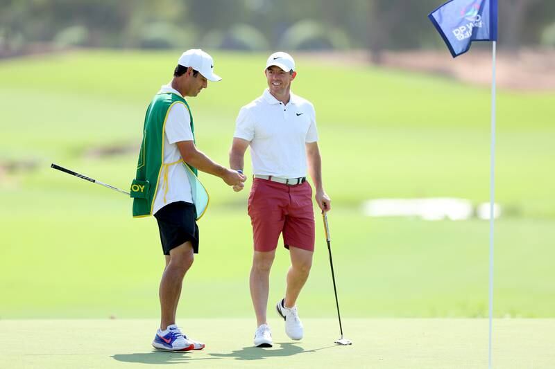 Rory McIlroy with his caddie Harry Diamond on the 18th hole during the DP World Tour Championship Rolex Pro-AM. Getty 