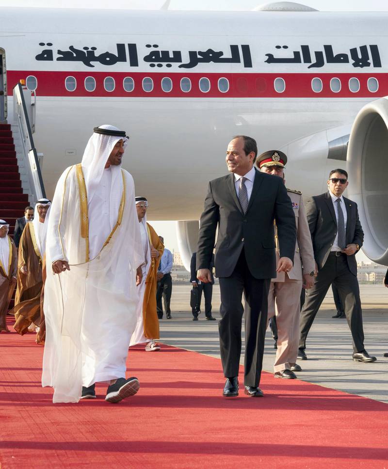 CAIRO, EGYPT - May 15, 2019: HH Sheikh Mohamed bin Zayed Al Nahyan Crown Prince of Abu Dhabi Deputy Supreme Commander of the UAE Armed Forces (L), is received by HE Abdel Fattah El Sisi, President of Egypt (R), upon arrival at Cairo international Airport.

( Mohamed Al Hammadi / Ministry of Presidential Affairs )
---