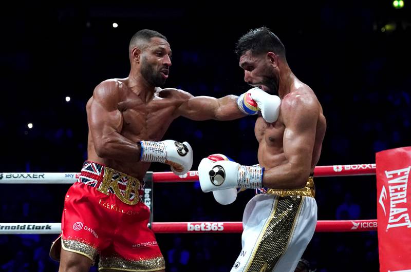 Kell Brook, left, in action against Amir Khan during their welterweight fight at the AO Arena, Manchester on Saturday February 19, 2022. PA