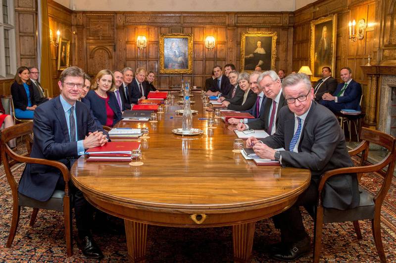 Britain's Prime Minister Theresa May is shown in this officially released photograph with her Brexit 'War Cabinet' for an away-day meeting at Chequers near Aylesbury, Britain, February 22, 2018. Picture taken February 22, 2018. Jay Allen/MoD/Handout via REUTERS - ATTENTION EDITORS - THIS IMAGE WAS SUPPLIED BY A THIRD PARTY FOR EDITORIAL USE ONLY. NO RESALES. NO ARCHIVES.