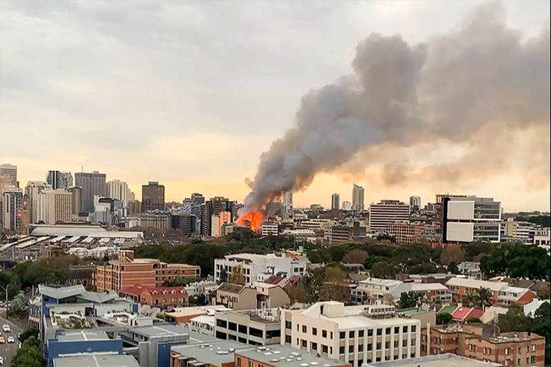 A still from a video posted by Michael Goode on Facebook shows flames engulfing the building. AFP