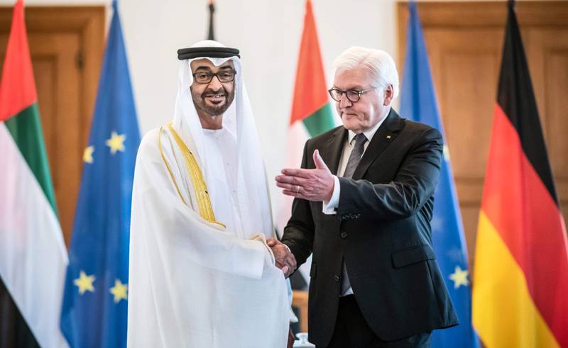 Sheikh Mohamed bin Zayed shakes hands with Mr. Steinmeier. AFP