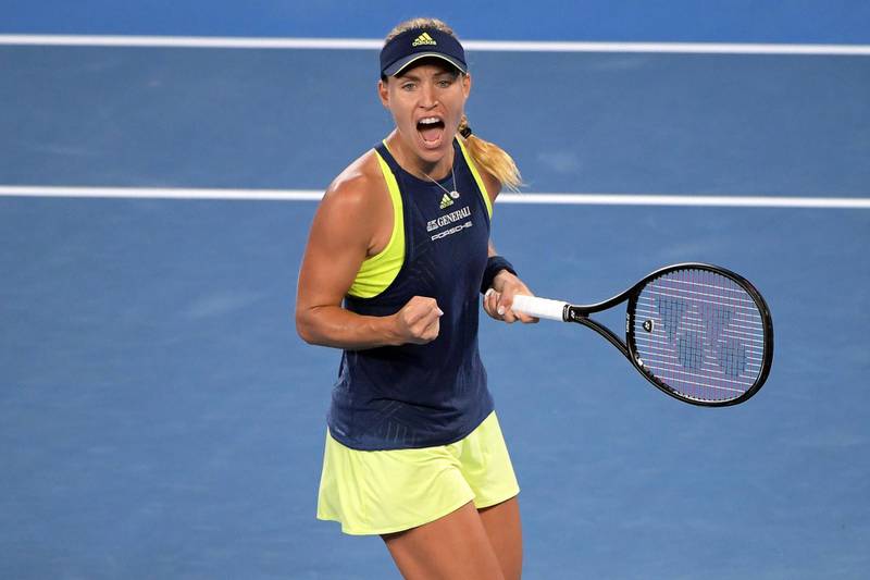 epa06456435 Angelique Kerber of Germany celebrates after winning her third round match against Maria Sharapova of Russia at the Australian Open Grand Slam tennis tournament in Melbourne, Australia, 20 January 2018.  EPA/TRACEY NEARMY AUSTRALIA AND NEW ZEALAND OUT