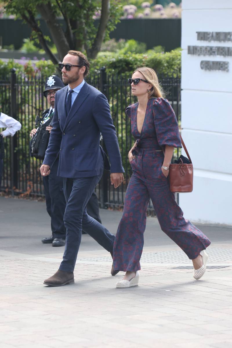 James Middleton and his wife Alizee Thevenet arrive on day eight. PA