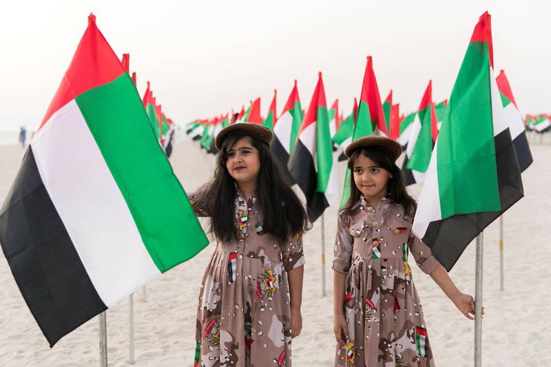 DUBAI, UNITED ARAB EMIRATES - NOV 2:Visitors of Flag Garden at Kite Beach.(Photo by Reem Mohammed/The National)Reporter: Section: NA FLAG DAY