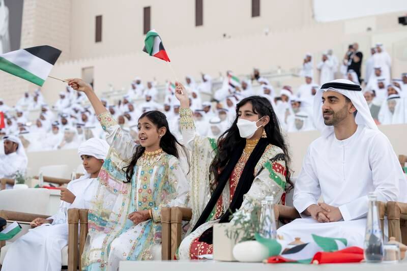 Sheikh Hamdan bin Mohamed; Sheikha Fatima bint Mohamed; Sheikha Shamma bint Khaled; and Sheikh Mohamed bin Khaled; attend the Union Parade during the Sheikh Zayed Heritage Festival. Hamad Al Kaabi / Presidential Court 