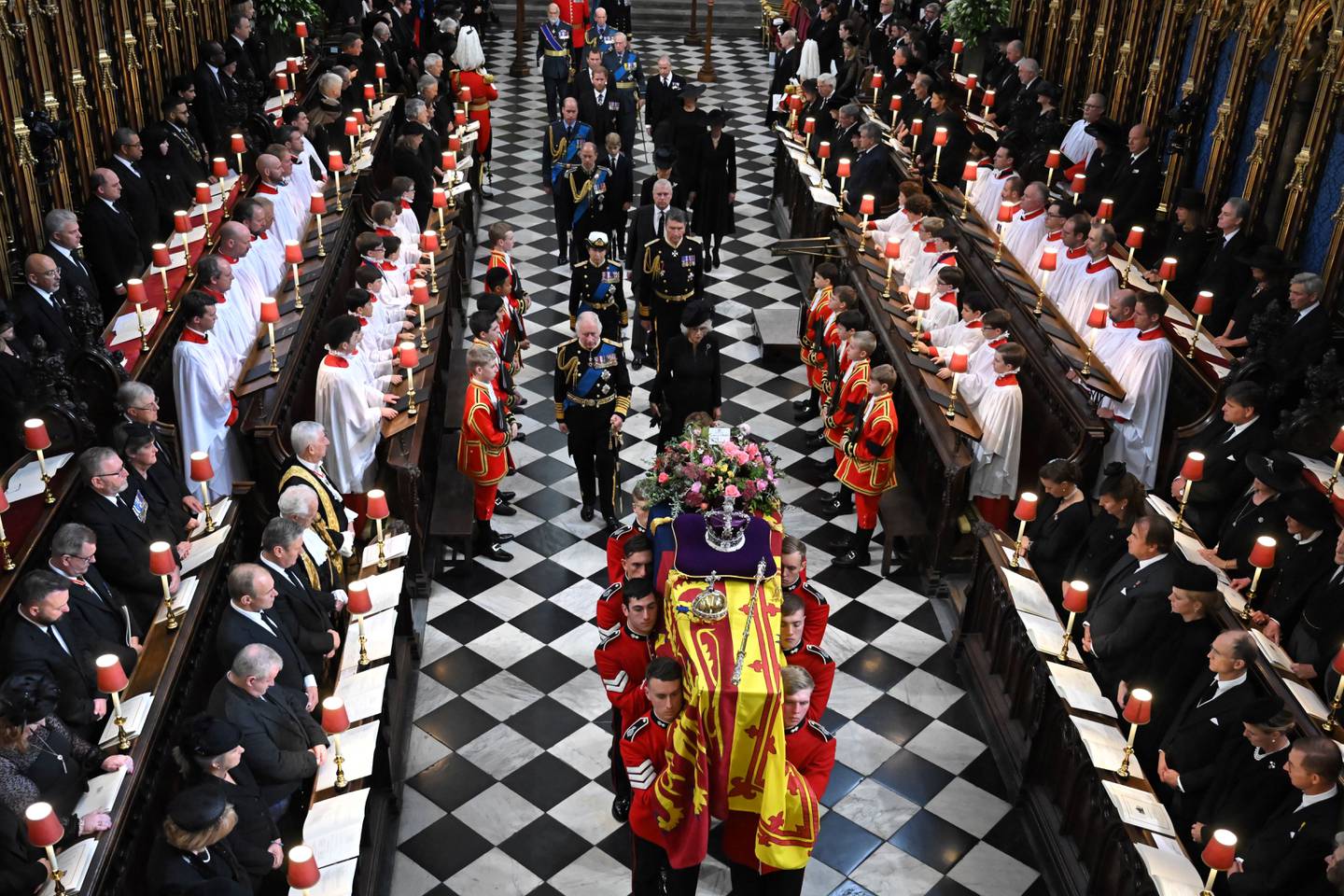 King Charles walks behind the coffin of Queen Elizabeth at Westminster Abbey during her state funeral. Getty Images