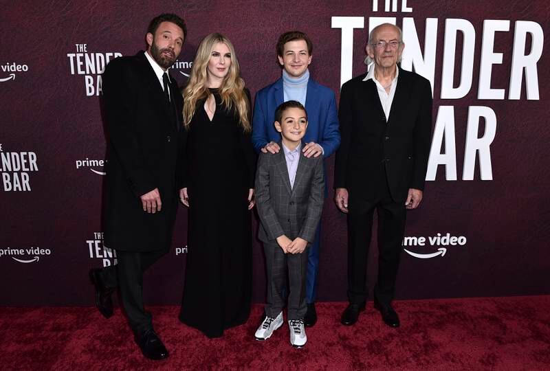 From left, Affleck, Lily Rabe, Daniel, Tye Sheridan and Christopher Lloyd arrive at the premiere of The Tender Bar in Los Angeles. AP