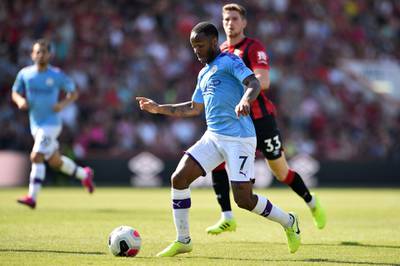 Manchester City's Raheem Sterling runs with the ball against Bournemouth. AFP