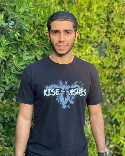 Egyptian-Canadian actor Mena Massoud​ wearing Zuhair Murad's Rise from the Ashes T-shirt. Instagram / menamassoud