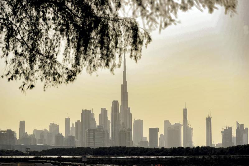 Dubai, United Arab Emirates - Reporter: N/A: Standalone / Weather. The sun sets behind the Dubai skyline. Tuesday, May 26th, 2020. Dubai. Chris Whiteoak / The National