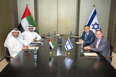 Emirati student Mansoor Al Marzooqi (seated behind left) with his father Mohamed Al Marzooqi across from Ilan Starosta, Israel consul general in Dubai, and Merzi Sodawaterwala, founder chairman of the International Federation of Indo-Israel Chambers of Commerce in Dubai. The meeting was held in Dubai on Sunday to congratulate and recognise Mansoor for becoming the first Emirati student in Israel. Courtesy: IFIICC