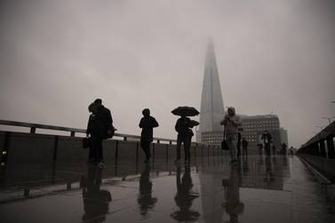 Commuters cross London Bridge in the City of London. UK government borrowing climbed to £270.6bn in the first 10 months of the fiscal year. Bloomberg
