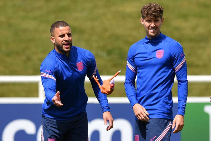 Kyle Walker and John Stones take part in a training session at St. George's Park ahead of the Euro 2020 match against Croatia. AFP