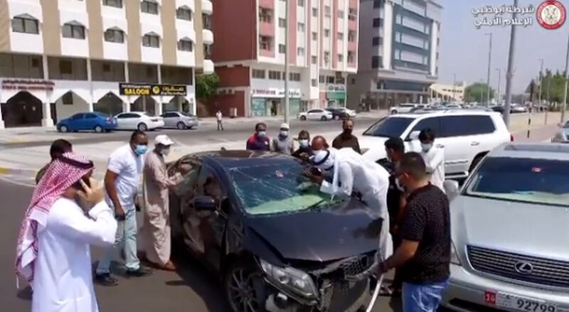 Motorists and pedestrians who stop at a crash site in a bid to get a closer look at what is happening also increase the risk of more accidents occurring, officials say. Photo: Abu Dhabi Police