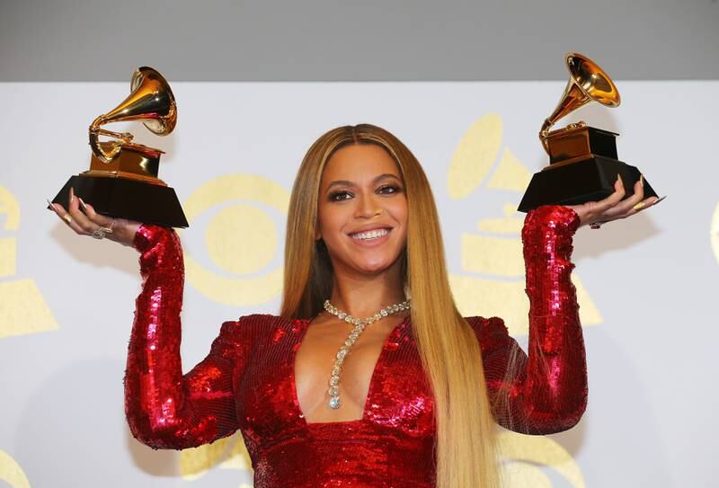 Beyonce holds the awards she won for Best Urban Contemporary Album for 'Lemonade' and Best Music Video for 'Formation' at the 59th Annual Grammy Awards in Los Angeles, California, February 12, 2017. Reuters