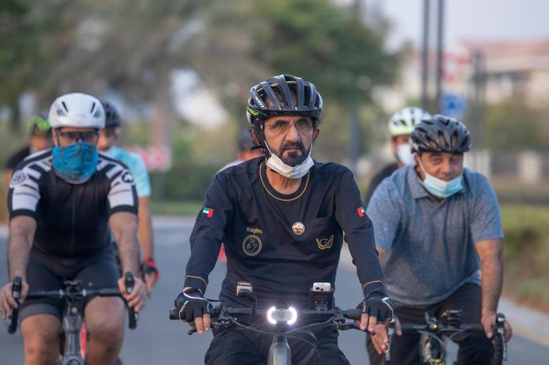 Sheikh Mohammed bin Rashid travelled down the cycle path by the city's canal and in to Downtown. Courtesy: Dubai Media Office
