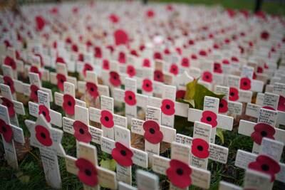 Memorial crosses at the Field of Remembrance at Westminster Abbey in London. PA