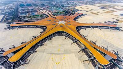 This photo taken on June 28, 2019 shows the terminal of the new Beijing Daxing International Airport. - Beijing is set to open an eye-catching multi-billion dollar airport resembling a massive shining starfish, to accommodate soaring air traffic in China and celebrate the Communist government's 70th anniversary in power. (Photo by STR / AFP) / China OUT / To go with China-Aviation, Focus by Patrick Baert