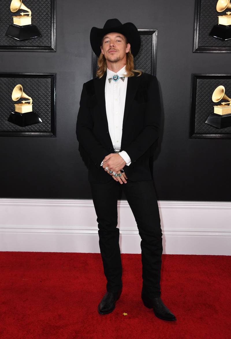 DJ Diplo arrives for the 62nd Annual Grammy Awards in Ralph Lauren. AFP
