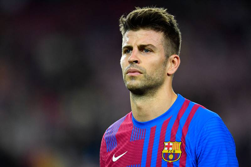 (FILES) In this file photo taken on October 30, 2021 Barcelona's Spanish defender Gerard Pique looks on during the Spanish League football match between FC Barcelona and Deportivo Alaves at the Camp Nou stadium in Barcelona.  - The Spanish Football Federation (RFEF) has negotiated a 24 million euro commission for Kosmos, the sports events company chaired by Barcelona's defender Gerard Pique, to transfer the Spanish Super Cup to Saudi Arabia, according to Spanish media outlet El Confidencial on April 18, 2022.  (Photo by Pau BARRENA  /  AFP)