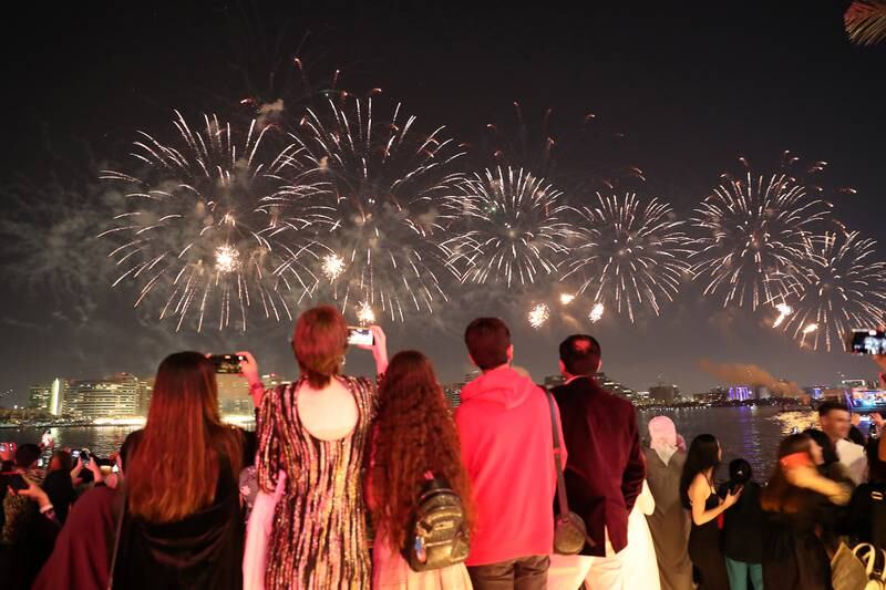 Yas Island hosted two fireworks shows: the traditional one at midnight and an earlier one at 9pm, which allowed families with younger children to see the lights spectacle. Pawan Singh / The National