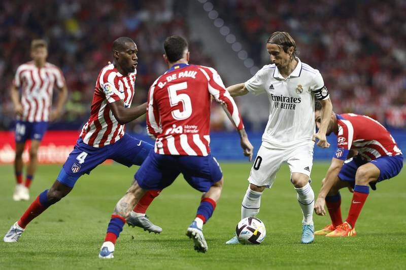 Real Madrid midfielder Luka Modric on the ball during the game against Atletico Madrid. EPA