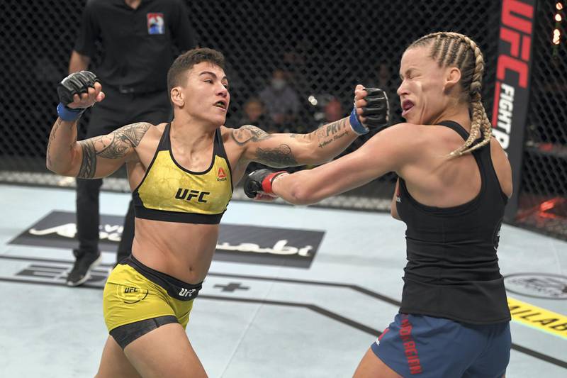 ABU DHABI, UNITED ARAB EMIRATES - OCTOBER 18:  (L-R) Jessica Andrade of Brazil punches Katlyn Chookagian in their women's flyweight bout during the UFC Fight Night event inside Flash Forum on UFC Fight Island on October 18, 2020 in Abu Dhabi, United Arab Emirates. (Photo by Josh Hedges/Zuffa LLC via Getty Images)