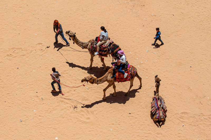 Some 200 guides and 1,500 horse and donkey owners stayed at Petra, without tourists, amid the Covid-19 pandemic. EPA