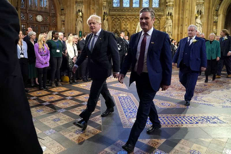 Prime Minister Boris Johnson, left, and the leader of the Labour Party Keir Starmer walk through the Central Lobby at the Palace of Westminster. PA