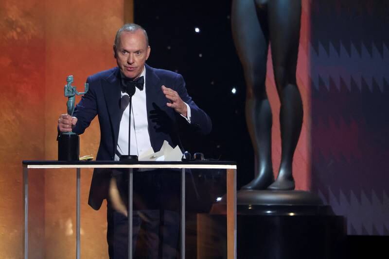 Michael Keaton receives the award for Outstanding Performance by a Male Actor in a Television Movie or Limited Series for 'Dopesick'. Reuters