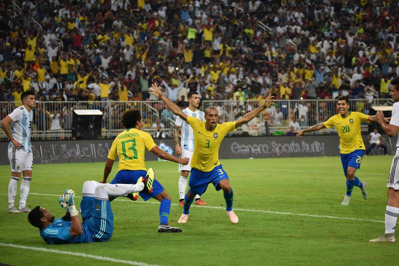 Brazil defender Miranda celebrates after scoring. AFP