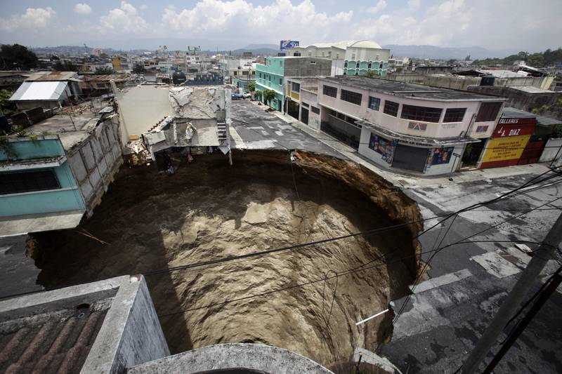 A giant sinkhole caused by tropical storm Agatha appeared in Guatemala City in 2010. Reuters
