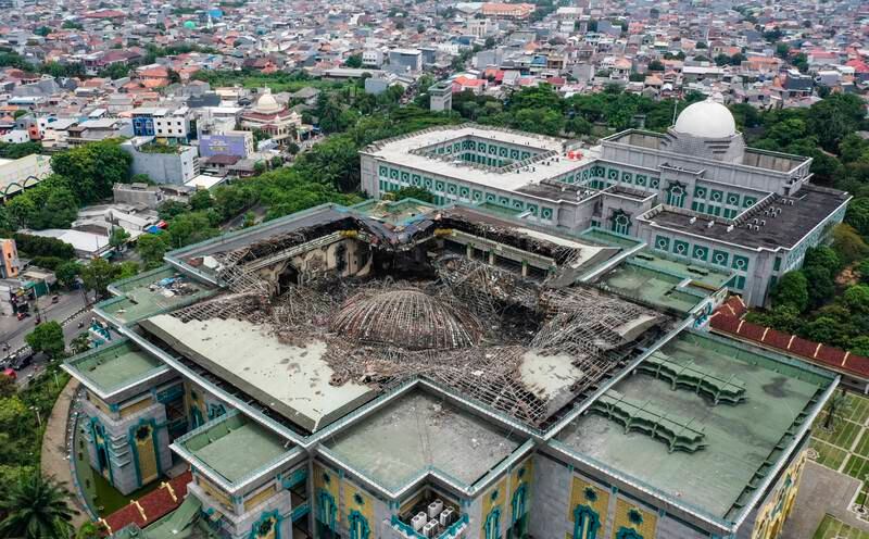 A photo taken with a drone shows the collapsed dome of the Jakarta Islamic Centre Grand Mosque. EPA