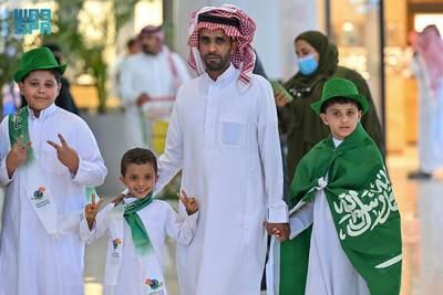 Tabuk’s children wear the green and white of Saudi Arabia as part of their National Day celebrations. SPA