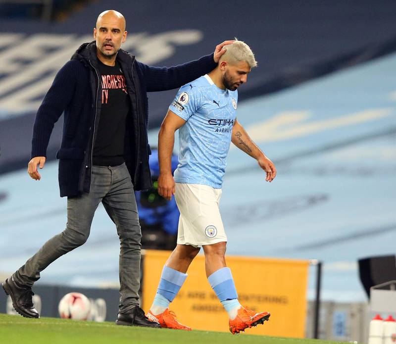 Manchester City's Argentinian striker Sergio Aguero (R) is substituted by Manchester City's Spanish manager Pep Guardiola during the English Premier League football match between Manchester City and Arsenal at the Etihad Stadium in Manchester, north west England, on October 17, 2020. RESTRICTED TO EDITORIAL USE. No use with unauthorized audio, video, data, fixture lists, club/league logos or 'live' services. Online in-match use limited to 120 images. An additional 40 images may be used in extra time. No video emulation. Social media in-match use limited to 120 images. An additional 40 images may be used in extra time. No use in betting publications, games or single club/league/player publications.
 / AFP / POOL / Alex Livesey / RESTRICTED TO EDITORIAL USE. No use with unauthorized audio, video, data, fixture lists, club/league logos or 'live' services. Online in-match use limited to 120 images. An additional 40 images may be used in extra time. No video emulation. Social media in-match use limited to 120 images. An additional 40 images may be used in extra time. No use in betting publications, games or single club/league/player publications.
