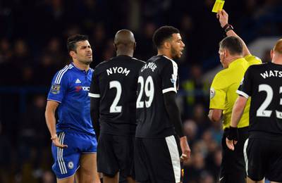 Chelsea's Diego Costa reacts as he is given a yellow card on Saturday in his team's Premier League match against Watford. Glyn Kirk / AFP / December 26, 2015 
