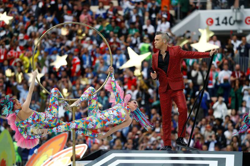 Robbie Williams performs during the opening ceremony. Kai Pfaffenbach / Reuters