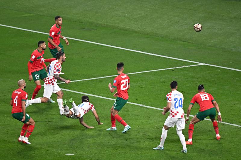 Croatia defender Josko Gvardiol heads the first goal against Morocco. AFP