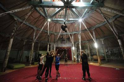 Team members practise at the Mongolian Circus School in Ulaanbaatar. AFP

  
 
