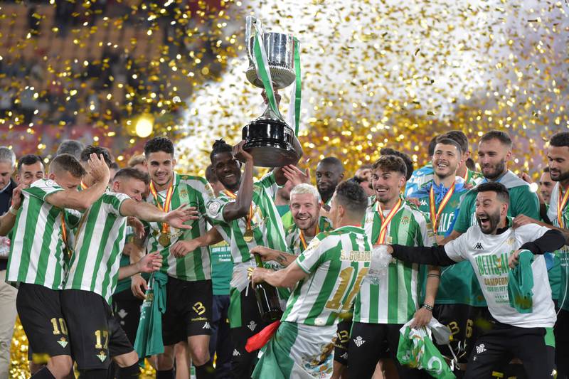 Real Betis players celebrate their victory beating Valencia in the Copa del Rey final. AFP