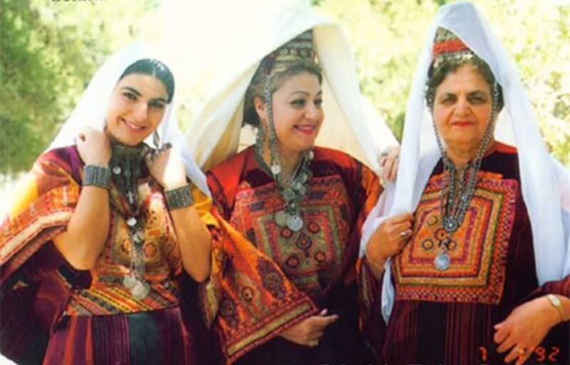 Palestinian Heritage Centre owner Maha Saca, centre, in traditional dress. All photos: Palestinian Heritage Centre