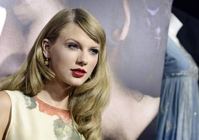 Taylor Swift says selfies rule over autographs. Dan Steinberg / Invision / AP