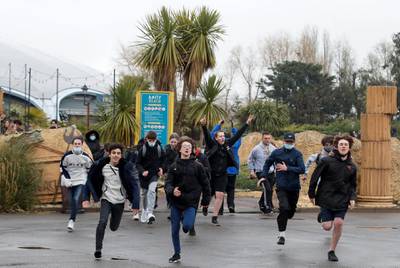 People run in as Thorpe Park reopens. Reuters
