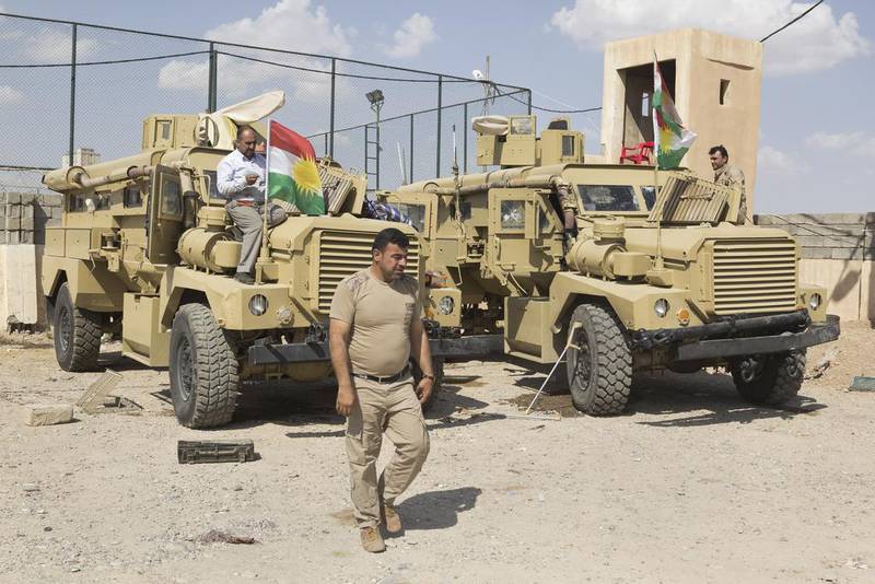 US-made Badger armoured vehicles are parked at a peshmerga base in Makhmur, Iraq, after the Kurdish  fighters captured them from ISIL. Hawre Khalid / Metrography