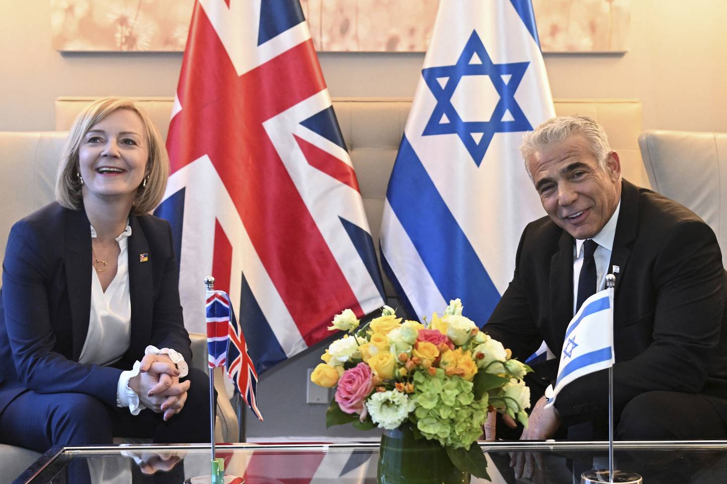 Liz Truss told Israeli Prime Minister Yair Lapid she would look into moving the UK embassy from Tel Aviv to Jerusalem during a bilateral meeting in New York in September. AP
