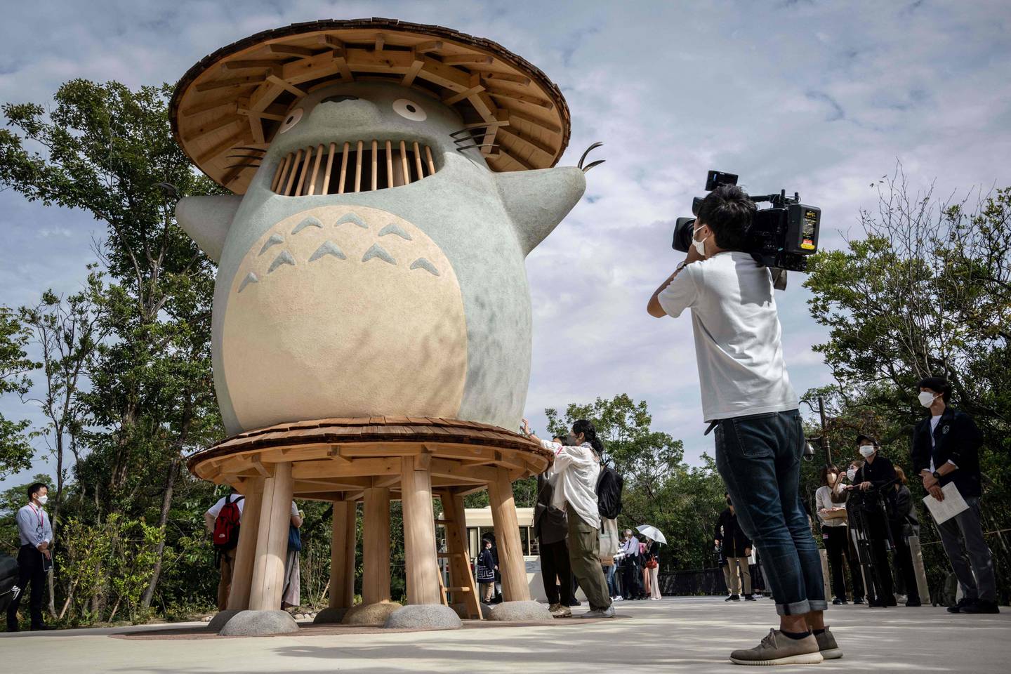 A huge grinning Totoro welcomes visitors. Studio Ghibli / AFP