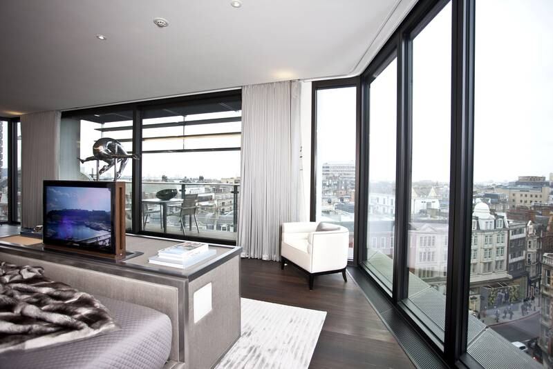 Mandatory Credit: Photo by REX/Shutterstock (1321782u)
A master bedroom of one of the luxury flats in One Hyde Park
Luxury apartment complex One Hyde Park built by Christian and Nick Candy, London, Britain - 05 Apr 2011
One Hyde Park has quickly become one of the most desirable - not to mention expensive - addresses on the planet. On average properties in the luxury London development cost Â£6,000 per square foot, compared to a city-wide average of Â£200 to Â£300. The complex was designed by Millennium Dome architect Lord Rogers and is the brainchild of property tycoon brothers Nick and Christian Candy. In total there are 86 apartments, as well as a private cinema, a 21m swimming pool, saunas, a gym, a golf simulator, a wine cellar and a valet and a concierge. The cheapest one-bedroom flat available is believed to cost around Â£6.75m, while larger one reportedly go for around Â£30m. Even the annual service charge tops Â£100,000 a year. The exclusive address is over the road from Harvey Nichols and just a stone's throw from Kensington Palace. It is also next door to the Mandarin Oriental hotel and a special team of 60 employees is on hand to provide room service to those who live at One Hyde Park.
